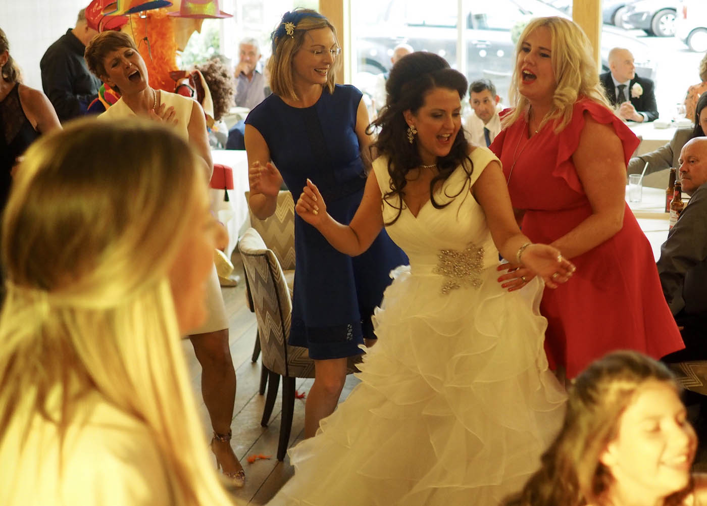 Why a Professional Wedding DJ Creates a Better Atmosphere Than a Playlist